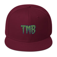 Load image into Gallery viewer, TMB Snapback Hat ( Green Letters & Blue Outline )