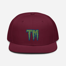 Load image into Gallery viewer, TM Snapback Hat ( Green Letters & Blue Outline )
