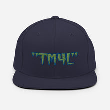 Load image into Gallery viewer, TM4L Snapback Hat ( Green Letters & Blue Outline )