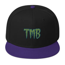 Load image into Gallery viewer, TMB Snapback Hat ( Green Letters & Blue Outline )