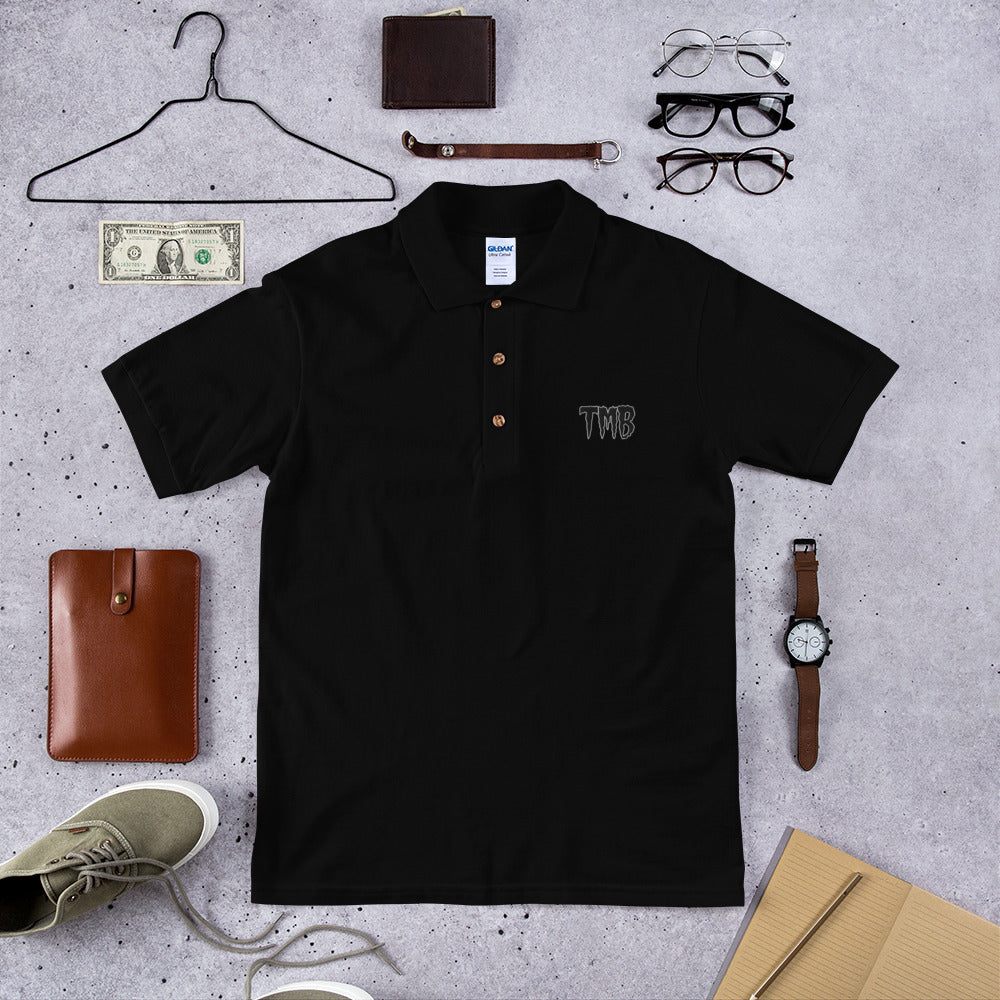 TMB Embroidered Polo Shirt ( Black Letters & White Outline )