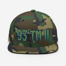 Load image into Gallery viewer, 93 TM 11 Snapback Hat ( Green Letters &amp; Blue Outline )
