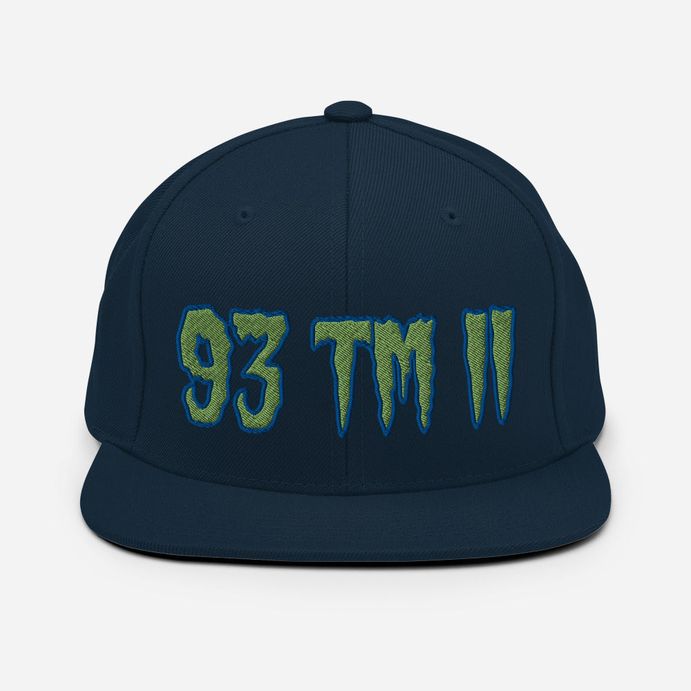 93 TM 11 Snapback Hat ( Green Letters & Blue Outline )