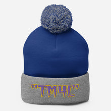 Load image into Gallery viewer, TM4L Pom-Pom Beanie ( Purple Letters &amp; Yellow Outline )

